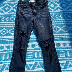 A&F black jeans ripped bottoms and rips in legs